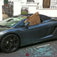 Illustration for article titled London rioters rough up a Lamborghini